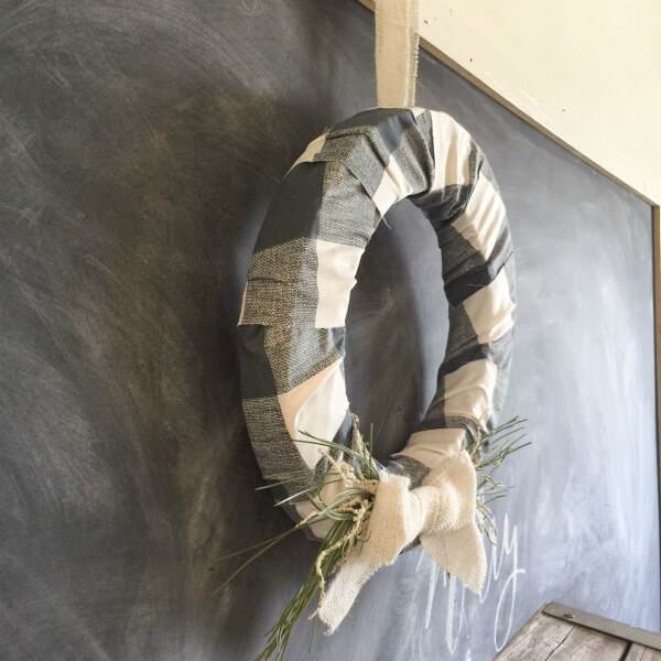 This farmhouse style buffalo check holiday wreath is the prefect addition to your decor this Christmas! holiday-wreath