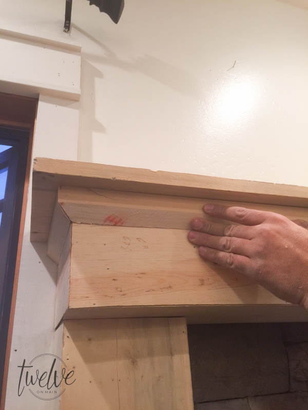 You have to see how they tansformed this fireplace into a farmhouse style stacked stone fireplace. Love the shiplap accents and the handmade corbels!