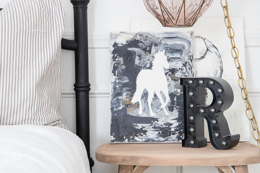 A touch of whimsey and radical with this modern style horse art in my daughters bedroom .