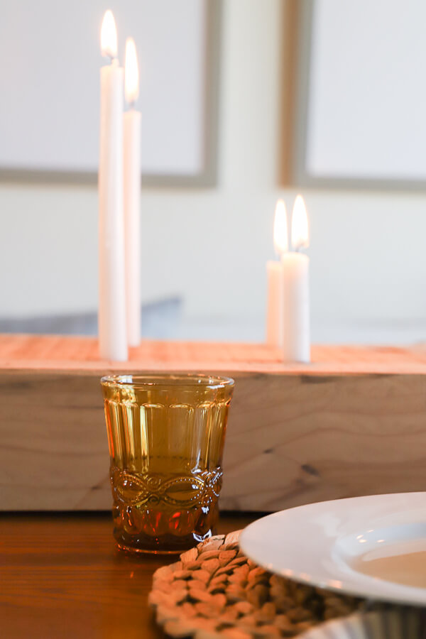 This DIY wood candle holder is so easy to make! The rustic candle holder makes such a statement and is the perfect focal point. Tutorial here.