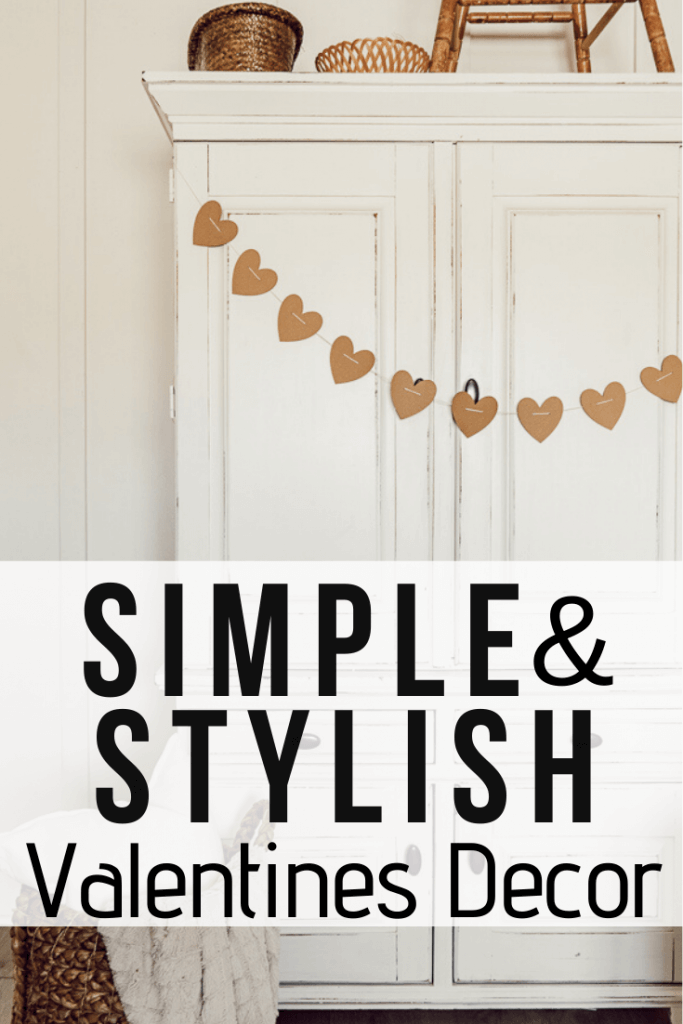 SImple and stylish Valentines decor. Make this easy Valentines garland with your Cricut machine. Neutral Valentines decor that will work with your home decor.