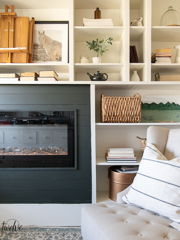 How I used my Wagner paint sprayer to makeover my office bookshelves and how we added a built in electric fireplace to the space in only a couple hours on a Saturday!