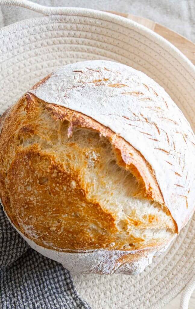 How to make an amazing dutch oven sourdough bread or sourdough boule! This has step by step instructions that make it really easy to plan your time and you will realize how easy it is to make!