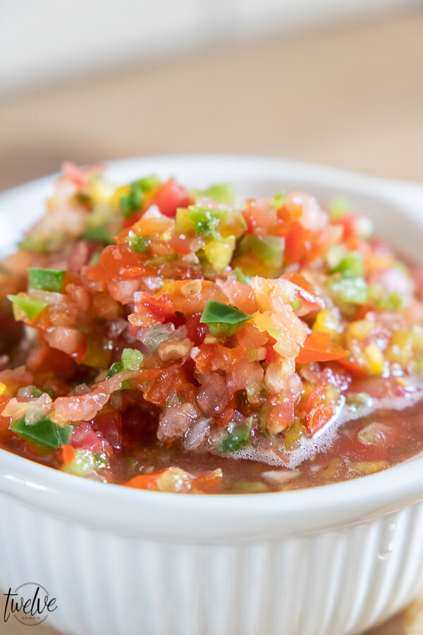 Get this zesty fresh salsa recipe now! Makes the most amazing nachos, perfect on eggs and breakfast burritos, and killer on tacos. Make it now!