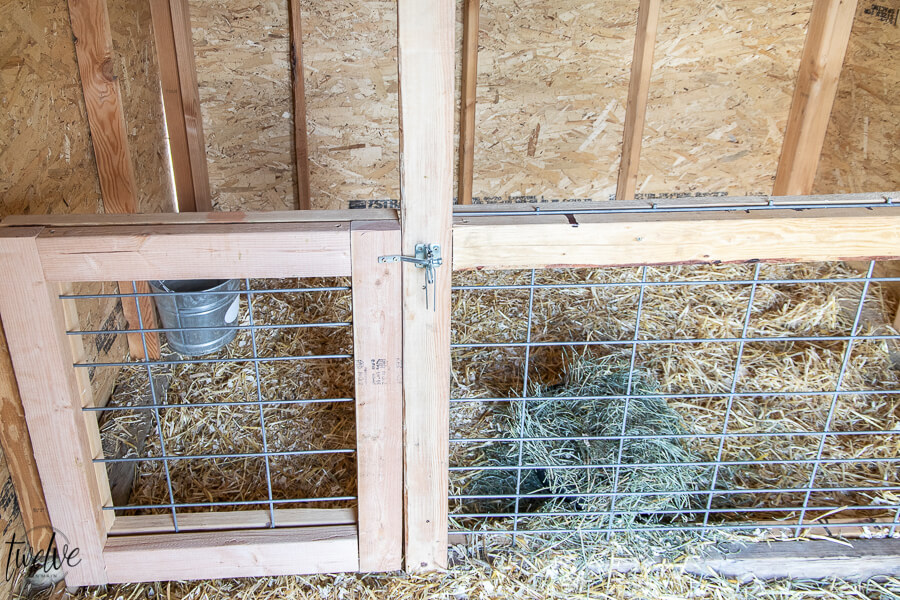 Goat house interior with separate pen