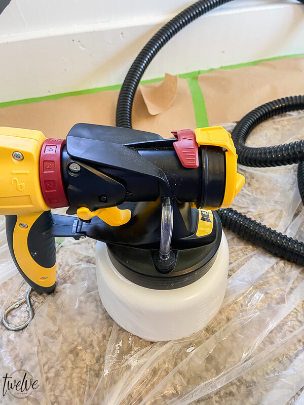 How to paint a room using a paint sprayer. Check out the step by step instructions, showing how easy it is to get this done in an afternoon. We used the Wagner Spray Tech Flexio 4300 paint sprayer and it did an amazing job.
