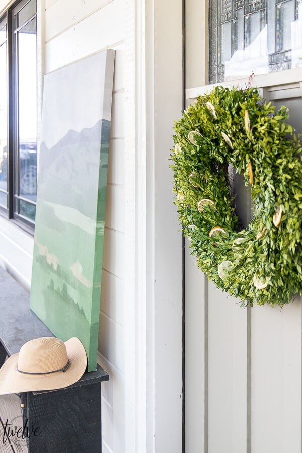 How to make a stylish boxwood and lemon summer wreath perfect for a front door or entry way. It is easy to create and inexpensive!