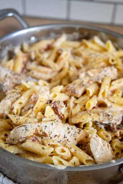 Creamy Tuscan Sun Dried Tomato and Chicken Pasta - Twelve On Main