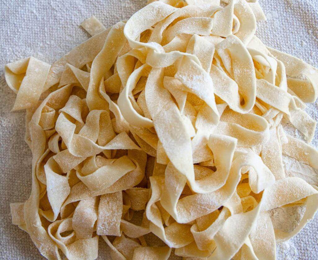 Want to use your sourdough starter or discard to make pasta? This is the most amazing sourdough pasta dough recipe. It is easy to make too!