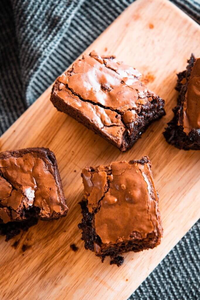 Easy recipe for the best fudgy sourdough discard brownies. These sourdough brownies are amazing! They are easy to make too! With a deep chocolatey base and  t touch of sourdough tang, this gooey and fudgy sourdough brownie recipe is the perfect balance, is easy to make, and tastes amazing!