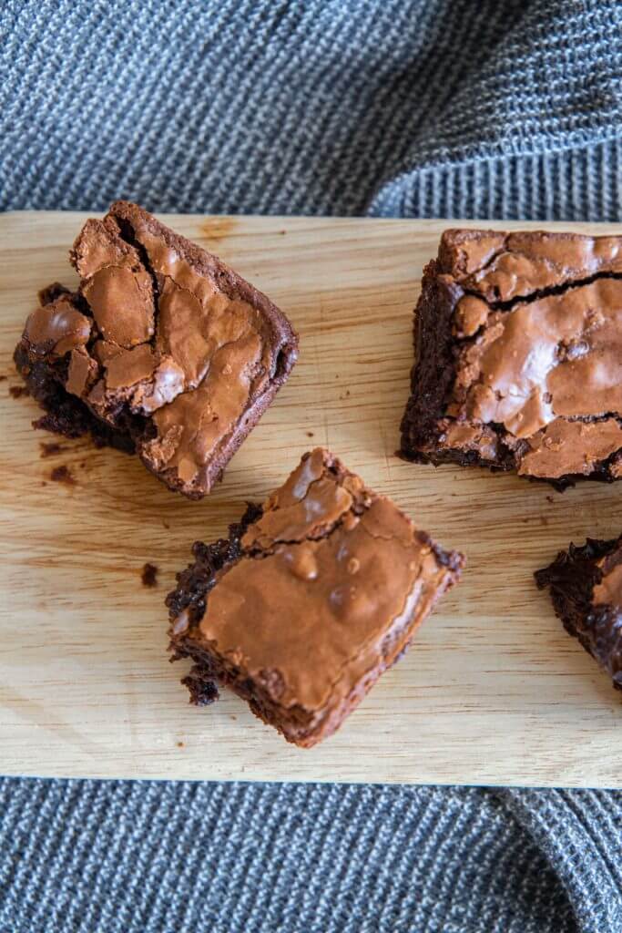 Easy recipe for the best fudgy sourdough discard brownies. These sourdough brownies are amazing! They are easy to make too! With a deep chocolatey base and  t touch of sourdough tang, this gooey and fudgy sourdough brownie recipe is the perfect balance, is easy to make, and tastes amazing!