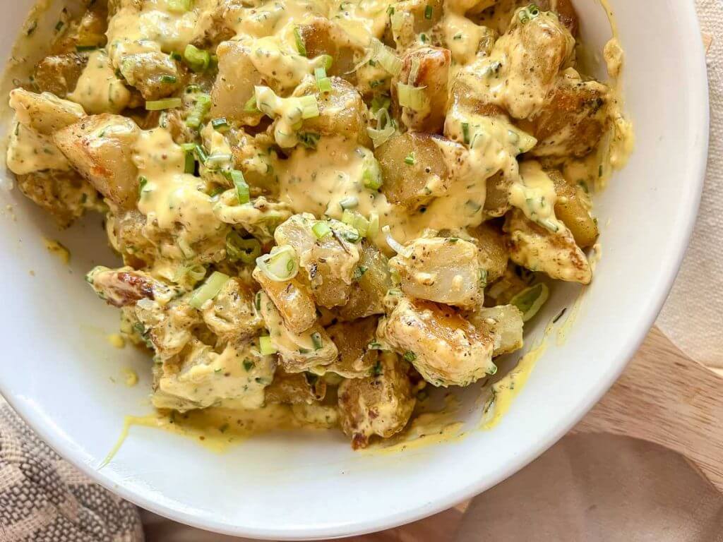 This warm potato salad recipe is the perfect side for any barbecue, pot luck or get together! Its simple and so flavorful!