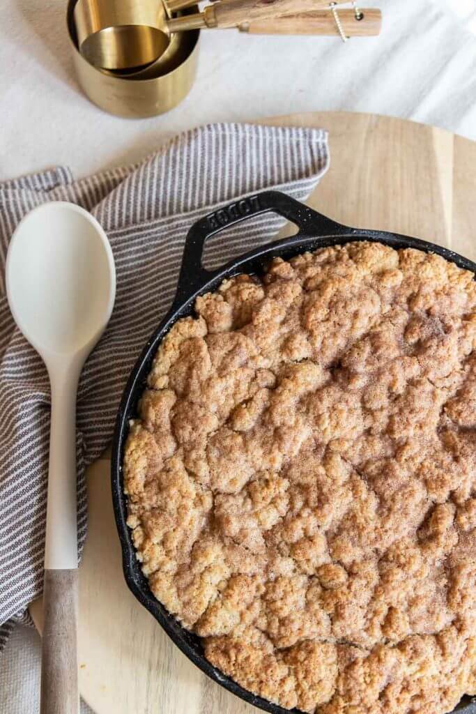 This decadent sourdough apple cobbler dessert is one of our favorites! It is a great way to use sourdough discard. With a soft biscuit topping and spiced apple filling it screams fall.