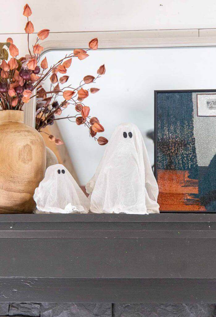 Make these adorable cheesecloth ghosts and add them to your Halloween decor! Its a great Halloween craft to involve kids or do on your own.