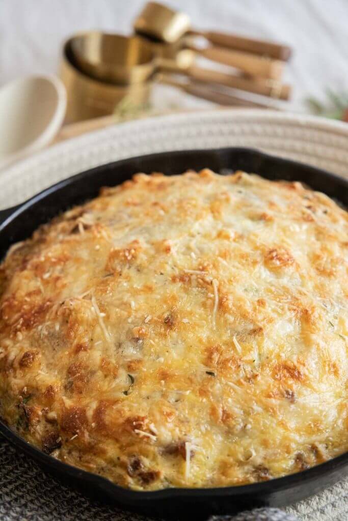 This amazing sourdough bread and egg bake is one of our most favorite meals! With day old bread, sausage and cheese its the perfect breakfast!