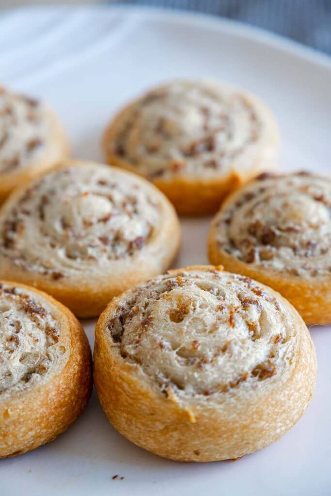 These sausage and cream cheese crescent rolls are an amazing, easy snack or appetizer to make for a party, afternoon snack and more! Perfect for a super bowl party too!