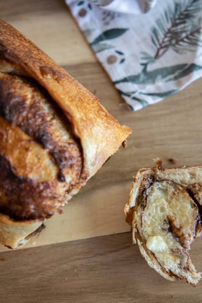 This cinnamon sugar sourdough bread is incredible! The cinnamon sugar mixture adds sweetness and flavor! The gooey cinnamon swirls with the fluffy soft sourdough bread is incredible. Get the recipe here!