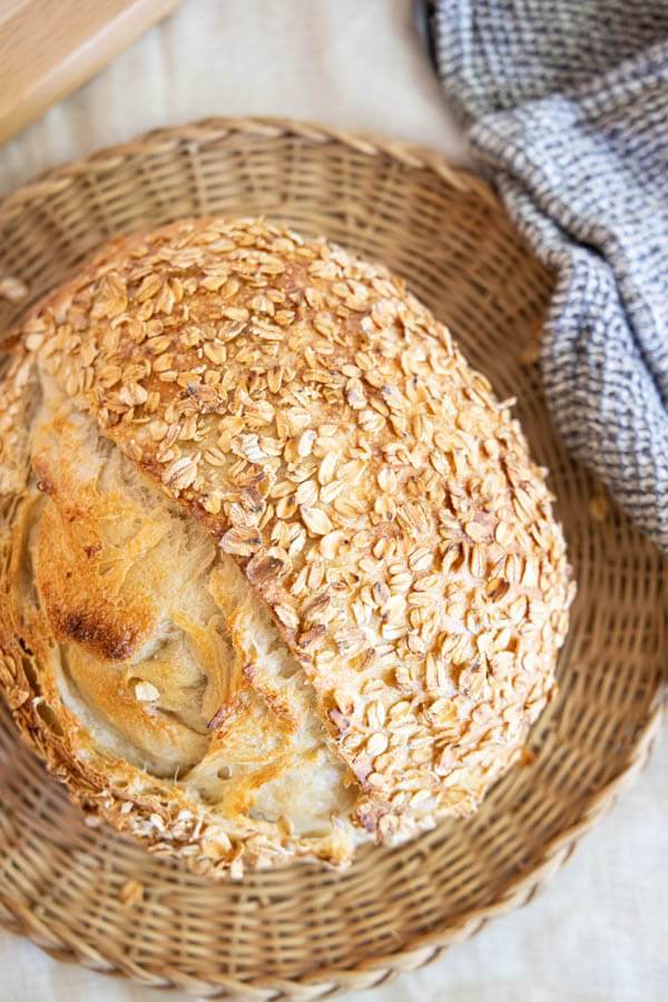 This amazing honey oat sourdough bread is so easy to make and tastes amazing! Slightly sweeter than regular sourdough bread with oats too!