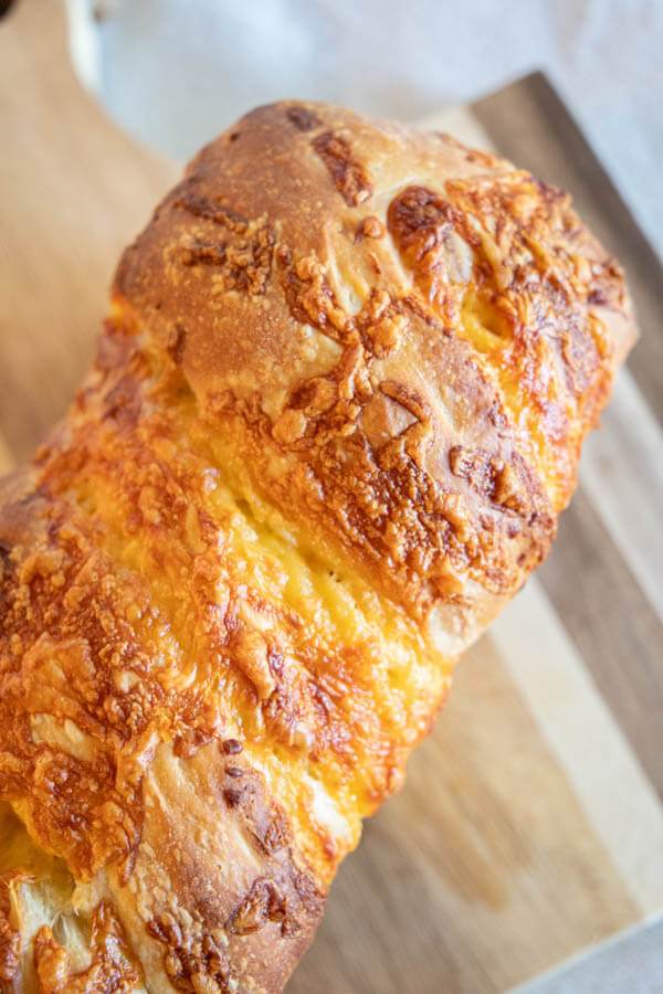 Make this amazing sourdough cheese bread. Its easy to make and the combination of the bread with the salty sharp cheese is perfection! This bread does not need much work, and the reward of a soft bread with cheesy goodness makes this such a good bread.