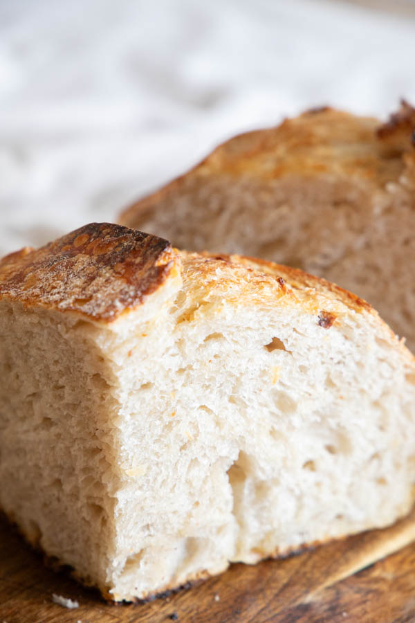 This amazing sourdough croissant loaf is the perfect combination of rustic sourdough bread, and refined delicate details. This bread has a soft, flakey texture, buttery flavor to accompany the delicate sourdough taste. It is an amazing take on the traditional sourdough bread!
