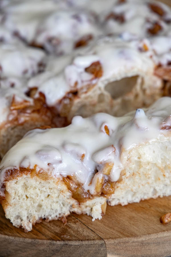 This amazing apple pie sourdough focaccia bread recipe is a glorious take on my regular sourdough focaccia bread. It is light and airy with a sweet and cinnamon spiced apple topping and elevated even more with the addition of a cream cheese icing drizzle.