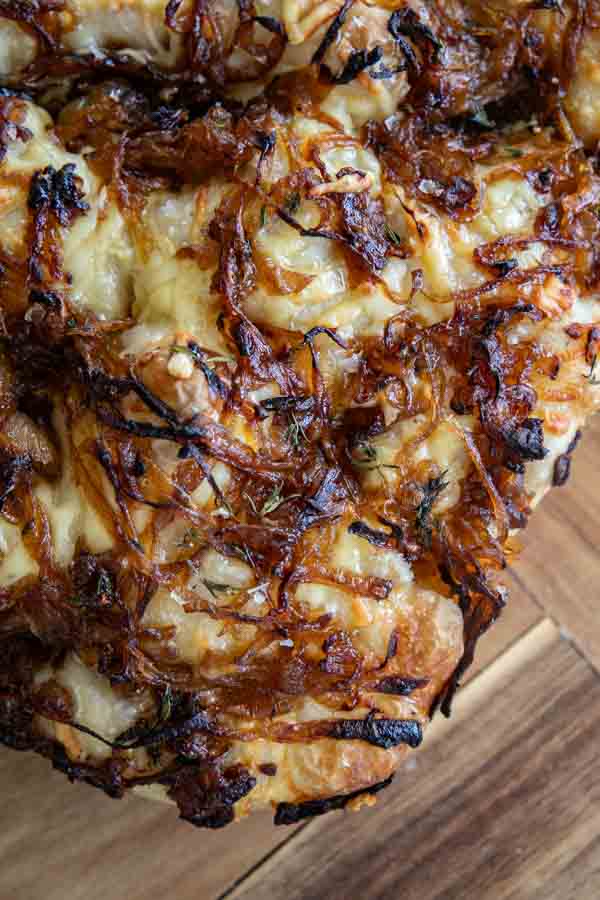Make this amazing french onion sourdough focaccia bread.  It has an amazing flavor with caramelized onions, gruyere cheese, and fresh herbs.