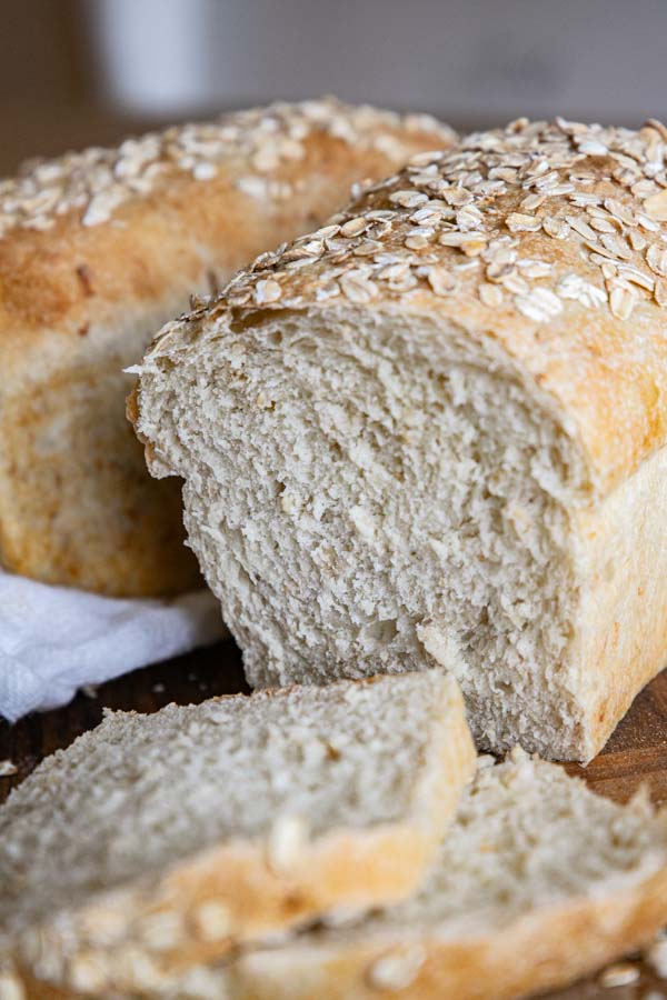 Make this amazingly soft and fluffy honey oat sourdough sandwich bread. It is true sourdough sandwich bread. There is no yeast in this bread. It is amazing and the flavor is perfection. The addition of oats makes this a more hearty and flavorful loaf of bread too!