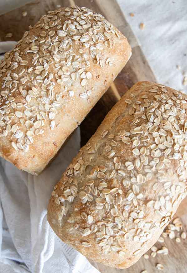 Make this amazingly soft and fluffy honey oat sourdough sandwich bread. It is true sourdough sandwich bread. There is no yeast in this bread. It is amazing and the flavor is perfection. The addition of oats makes this a more hearty and flavorful loaf of bread too!